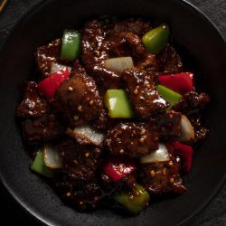 Piezas filete de res con pimientos rojos, cebolla | P. F. Chang's